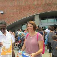 <p>Eliza Dean and Melissa Frey with their cereal boxes to view the eclipse.</p>