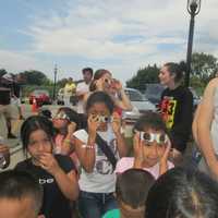 <p>Kids gather at Ossining Library for the solar eclipse.</p>