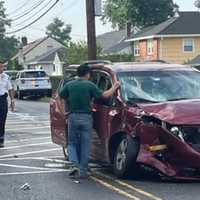 <p>A passenger in the Toyota minivan was hospitalized following the morning school bus crash in New Milford.</p>