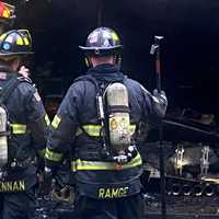 <p>An investigator from the Bergen County Prosecutor&#x27;s Arson Investigations unit (at left) responded to assist in determining the cause of the blaze.</p>