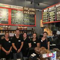 <p>Scott Elfant, Center, and the employees of Caffe a la Mode.</p>