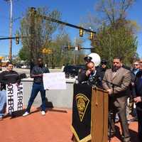 <p>Michael Picard, left, and Dontrell Brown, second from left, protest changes to the open carry gun law now being considered in the state legislature.</p>