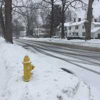 <p>Snow is beginning to coat the roads again across Fairfield County, with another storm moving through on Sunday.</p>