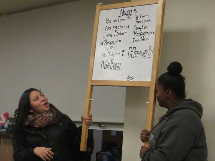 Nicole Hernandez, left, and Melanie Blackburn display &quot;norms&quot; -- or rules -- agreed on with their peers including &quot;be on time,&quot; &quot;come sober&quot; and &quot;no electronics&quot; during class.