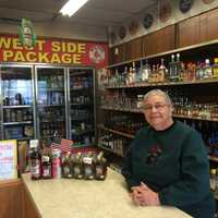 <p>Theresa Valentino stands at the counter in West Side Package, a spot she&#x27;s known since 1968.</p>