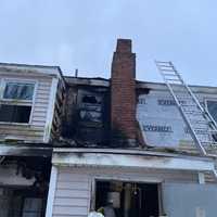 <p>Three residents were displaced during a two-alarm fire at a two-family home.</p>