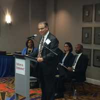 <p>President Joe Carbone addresses the graduates of Platform to Employment in Shelton Thursday.</p>