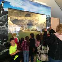 <p>Children on a field trip crowd around the new penguin exhibit at Beardsley Zoo in Bridgeport.</p>