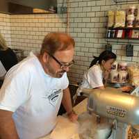 <p>Owner David Mainiero watches the vapor from liquid nitrogen creating ice cream in seconds at Milkcraft of Fairfield.</p>