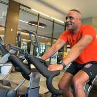 <p>Chief Bergen County Prosecutor Jason Love before a spin class led by Paramus Deputy Police Chief Robert Guidetti as part of the Six Weeks of Wellness Challenge.</p>