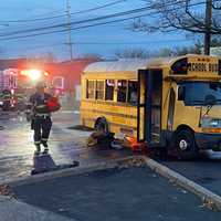 <p>Firefighters doused the fire aboard the school bus on Route 17 in Paramus.</p>