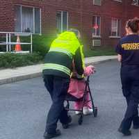 <p>Emergency responders tended to the elderly residents at Ridgecrest Senior Housing in Ridgewood.</p>