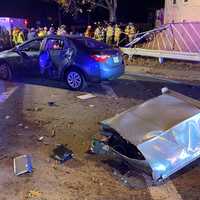 <p>A call box on a utility pole struck by the Jeep flew into a sedan, witnesses said.</p>