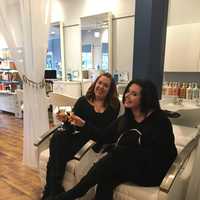 <p>Stylists take a break at Runway Blowout Lounge.</p>