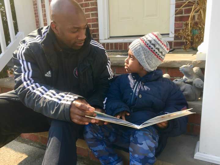 Carlyle Myrie of Hackensack and his son, Ethan, 4. Myrie is a soccer coach in Clifton and began teaching spin at local gyms after he was let go from Teaneck schools.