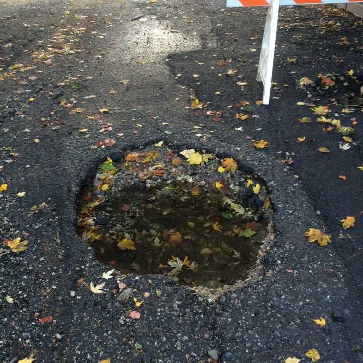 Holes in the road like this one closed Route 22 at Franklin Turnpike in Mahwah today.