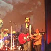 <p>John Stamos singing with The Beach Boys.</p>