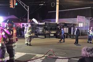 Hawthorne Ambulance Knocked On Its Side, Three Removed