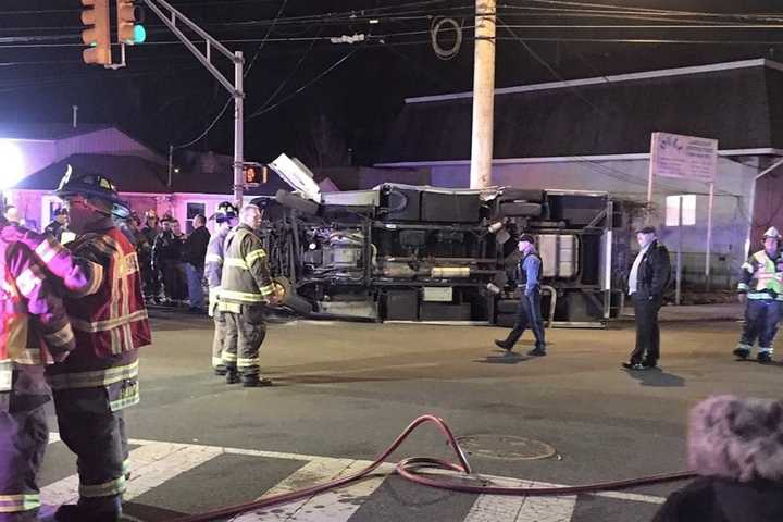 Hawthorne Ambulance Knocked On Its Side, Three Removed