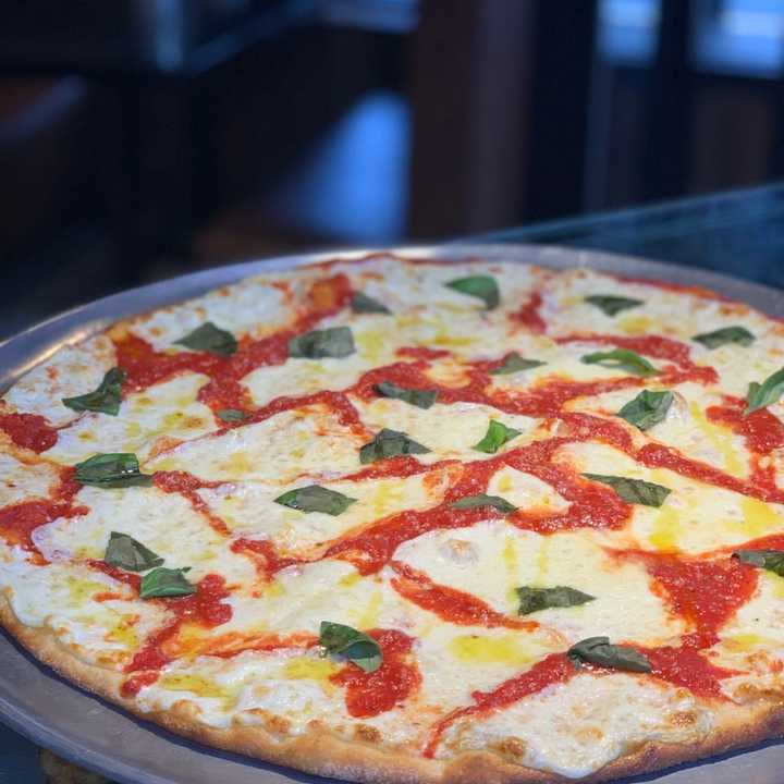 Margarita Pizza (a light and airy old fashioned pizza with fresh mozzarella and San Mariano tomato sauce) from Uncle Louie’s Pizza, located at 754 Franklin Ave., in Franklin Lakes