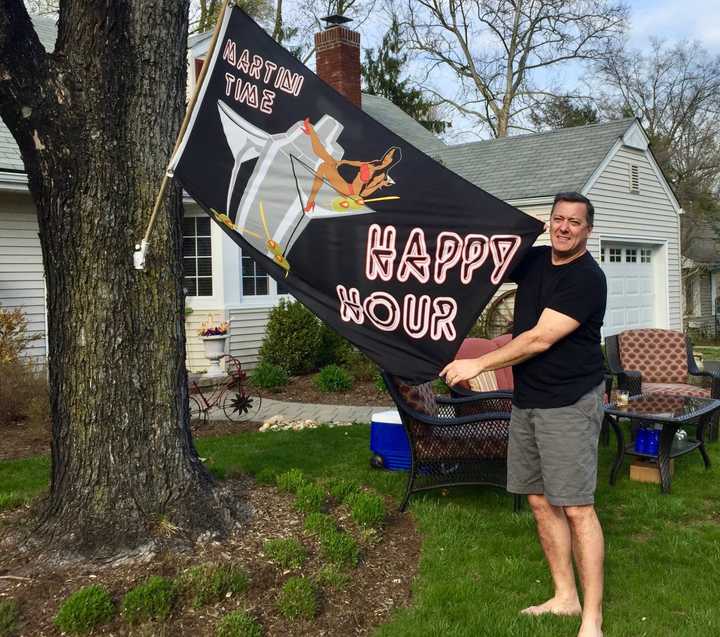 Ridgewood&#x27;s Jeff Johnson flies his &quot;Happy Hour&quot; flag high on Saturday.