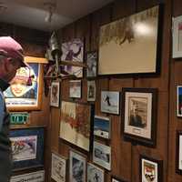 <p>Many of Hickory and Tweed&#x27;s walls and counter tops are littered with photos of customers&#x27; families similar to anyone&#x27;s house.</p>