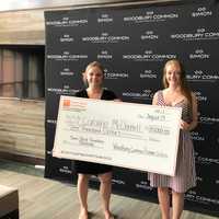 Simon Scholarship Winner Receives Check From Woodbury Common