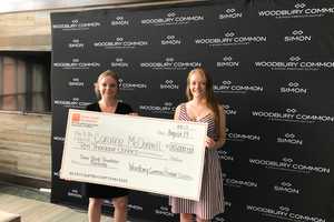 Simon Scholarship Winner Receives Check From Woodbury Common