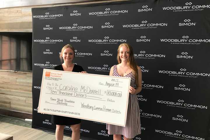 Simon Scholarship Winner Receives Check From Woodbury Common