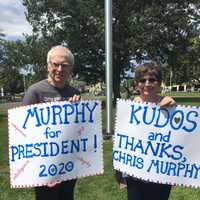 <p>Bill Shute and Jackie Reizes throw their support behind Chris Murphy for the 2020 presidential campaign. &#x27;We like what he&#x27;s doing in the Senate,&#x27; Bill said, &#x27;but we&#x27;re encouraging other things.&#x27; Wife Jackie made the signs &#x27;in a rush&#x27; for the event.</p>