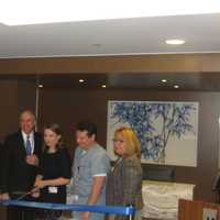 <p>White Plains Hospital President Susan Fox, center, joins other hospital executives and Mayor Tom Roach, far left, at Monday&#x27;s ribbon-cutting ceremony to celebrate completion of four new floors at the East Post Road facility.</p>