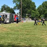 <p>The child being transported by DIAZ Ambulance personnel.</p>