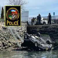 Man Drives Car Off Greenwich Roadway Into Coastal Rocks