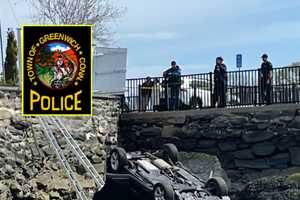 Man Drives Car Off Greenwich Roadway Into Coastal Rocks