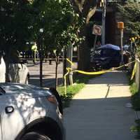 <p>The crash occurred at Railroad Avenue at Iranistan Avenue in Bridgeport on Thursday. At least one person was killed. The car fleeing police hit this blue Toyota Yaris.</p>