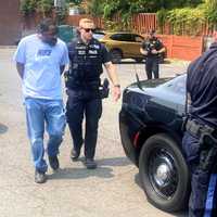 <p>Keith Miller of Iselin is taken into custody in the parking lot of the CVS on Rock Road in Glen Rock on Tuesday, June 6.</p>