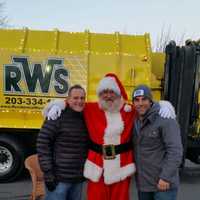 <p>Santa joins the guys from RWS for a Toys for Tots event in Trumbull last weekend.</p>