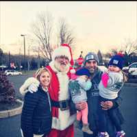 <p>Santa greets families at a Toys for Tots event held by RWS in Trumbull last weekend.</p>