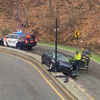 Sedan Slams Into Lamp Post Near Ridgewood Train Station