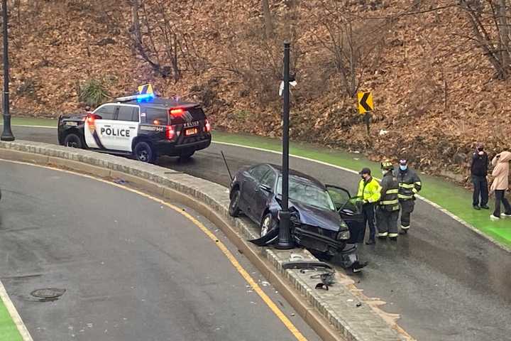 Sedan Slams Into Lamp Post Near Ridgewood Train Station