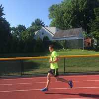 <p>Aidan Walsh, owner of Ridgewood&#x27;s Racefaster, LLC, warms up on the track.</p>