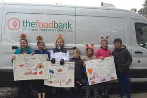 Holmes School Donates 100 Turkeys To Food Bank