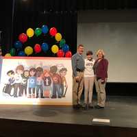 <p>Sarah Harrison poses with her winning artwork in the Google 4 Doodle contest on Tuesday at Bunnell High in Stratford.</p>