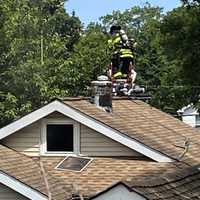 <p>Firefighters had the two-alarm blaze on Kipp Street knocked in minutes, then checked for any extension to the attic.</p>