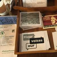 <p>Sample postcards at The Black Cow Coffee Co. in Croton.</p>