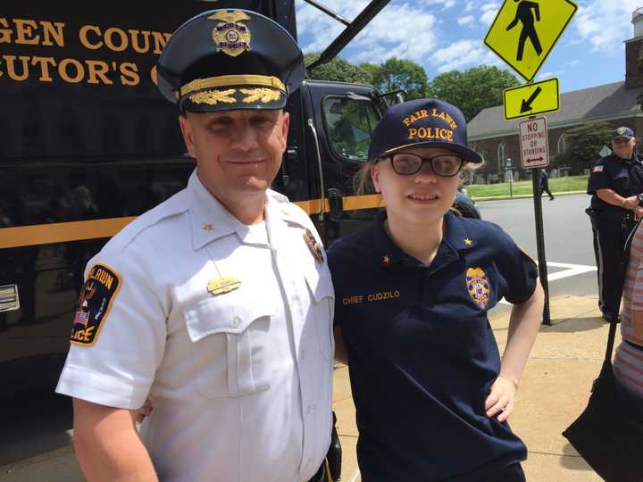 Fair Lawn Police Chief Glen Cauwels with Natalia Cudzilo, 15. The highlight of her day was locking up her sisters. Don&#x27;t worry... she let them out.