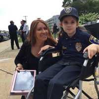 <p>Oakland&#x27;s &quot;Chief for a Day&quot; Amelia Lombardo-Reischel, 9, and mom Tara Reischel.</p>