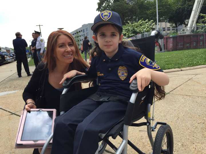 Oakland&#x27;s &quot;Chief for a Day&quot; Amelia Lombardo-Reischel, 9, and mom Tara Reischel.