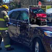 <p>Hawthorne firefighters at work following crash at Utter and Lincoln avenues.</p>