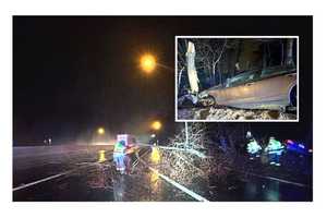 Sedan Slides Off Rain-Slicked Route 17